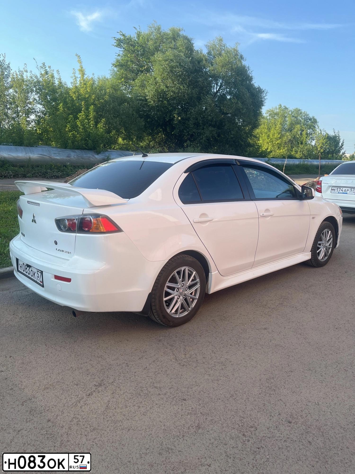 Фото автомобиля MITSUBISHI LANCER, 2012 — госномер А631СО252. Цвет: Белый