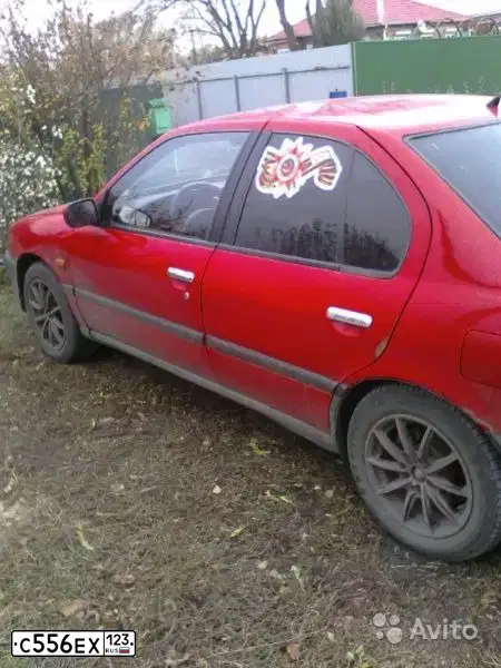 Фото автомобиля NISSAN PRIMERA, 1996 — госномер С556ЕХ123. Цвет: КРАСНЫЙ