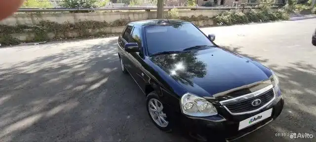 Фото автомобиля LADA PRIORA, 2011 — госномер У589АК05. Цвет: СИНЕ-ЧЕРНЫЙ