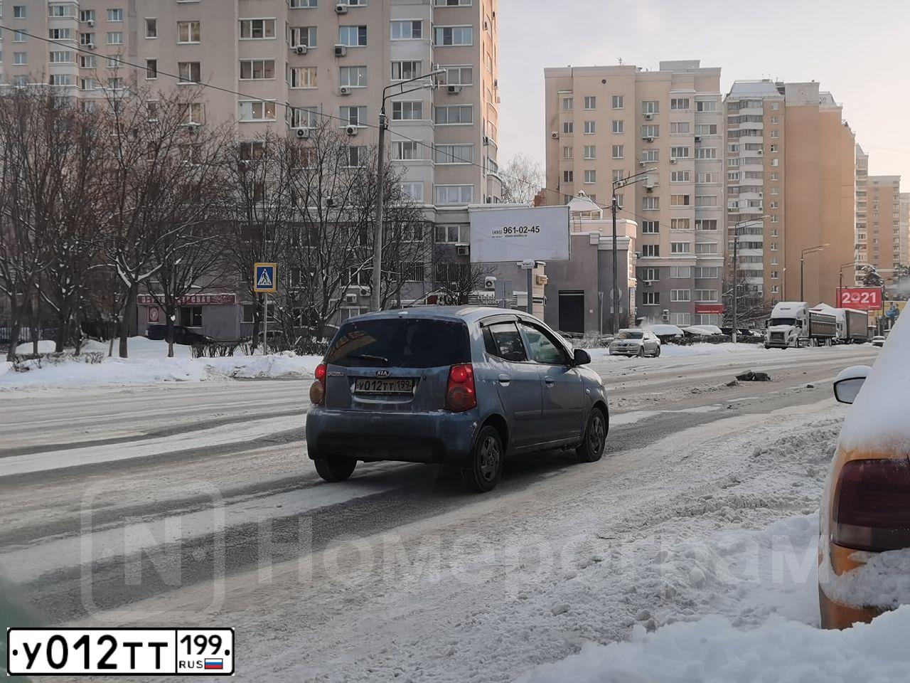 Фото автомобиля KIA PICANTO / MORNING, 2009 — госномер У012ТТ199. Цвет: СЕРО-ГОЛУБОЙ
