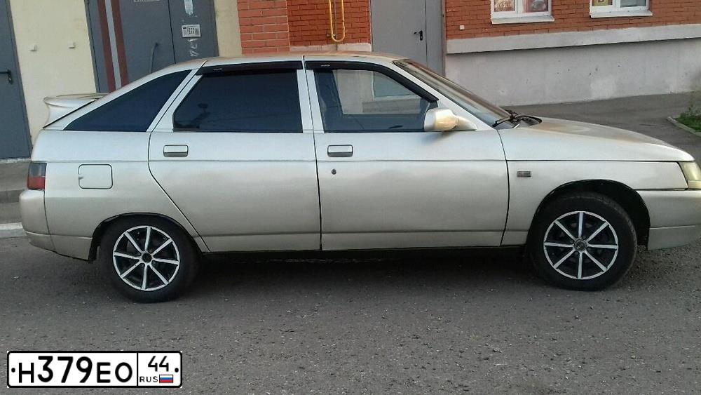 Фото автомобиля LADA 2112, 2004 — госномер Н379ЕО44. Цвет: СЕРЕБРИСТО-БЕЖЕВЫЙ