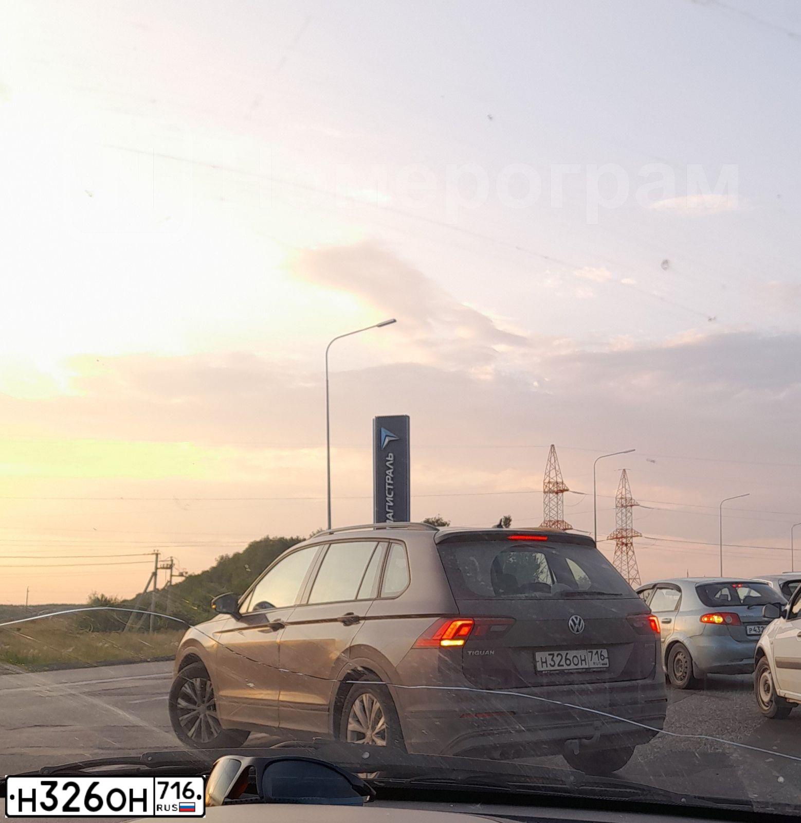 Фото автомобиля VOLKSWAGEN TIGUAN, 2020 — госномер Н326ОН716. Цвет: Коричневый