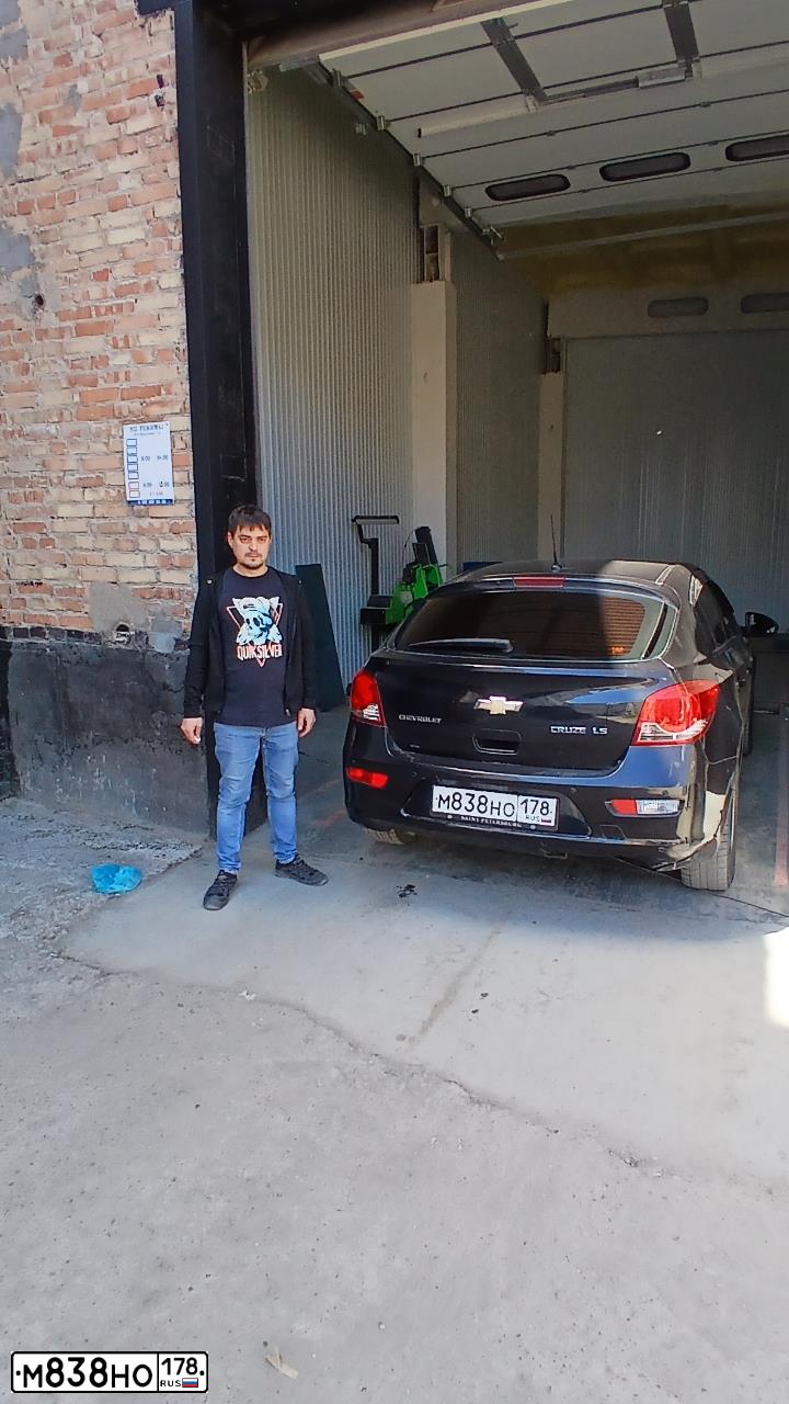 Фото автомобиля CHEVROLET CRUZE, 2012 — госномер М077МВ702. Цвет: ЧЕРНЫЙ МЕТАЛЛИК