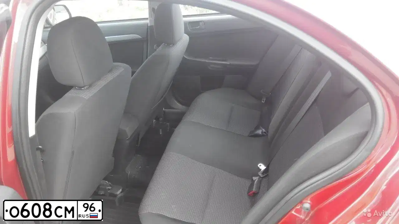 Фото автомобиля MITSUBISHI LANCER, 2010 — госномер О608СМ96. Цвет: КРАСНЫЙ
