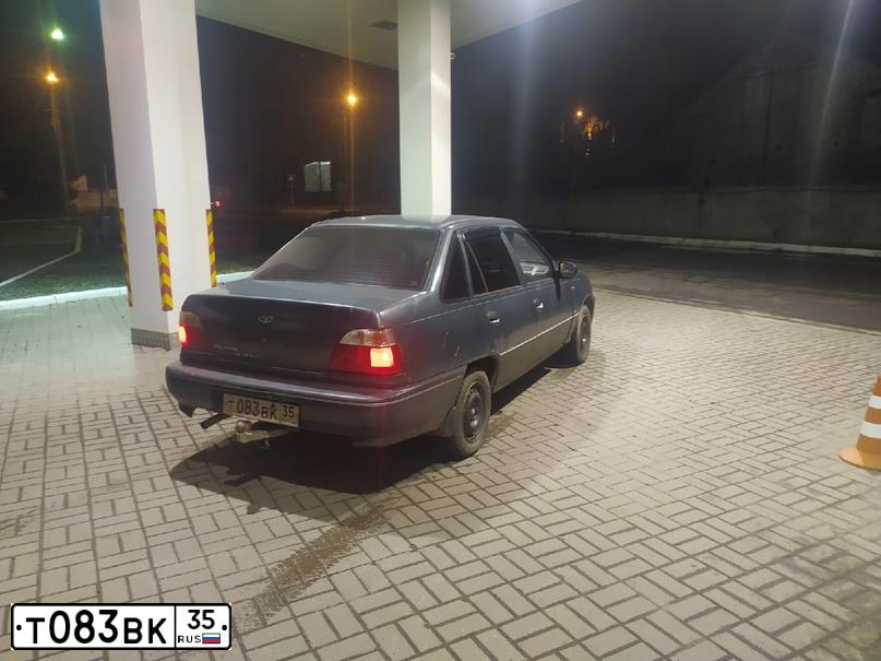 Фото автомобиля DAEWOO NEXIA, 1996 — госномер Р410СР76. Цвет: Темно-зеленый