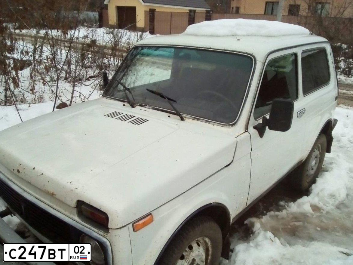 Фото автомобиля LADA 2121 NIVA, 2004 — госномер С247ВТ02. Цвет: ЯРКО-БЕЛЫЙ