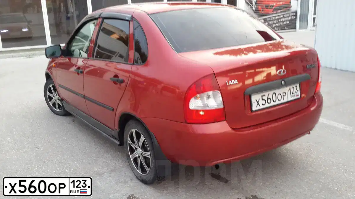Фото автомобиля LADA 1118 KALINA, 2010 — госномер Х560ОР123. Цвет: СЕРЕБРИСТО-КРАСНЫЙ