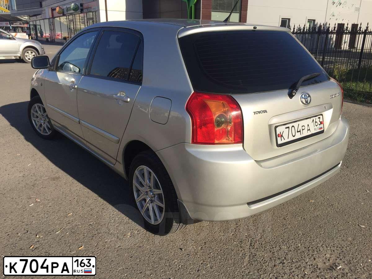 Фото автомобиля TOYOTA COROLLA, 2004 — госномер Е981ВВ154. Цвет: СЕРЕБРИСТЫЙ
