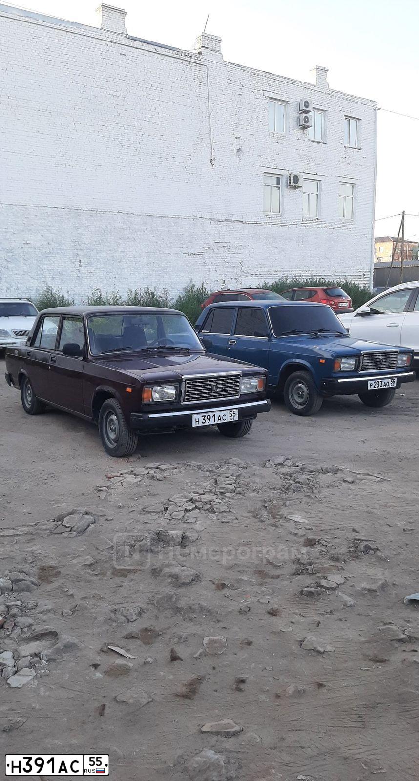 Фото автомобиля LADA 2107 LADA, 2006 — госномер Н391АС55. Цвет: ТЕМНО-КРАСНЫЙ