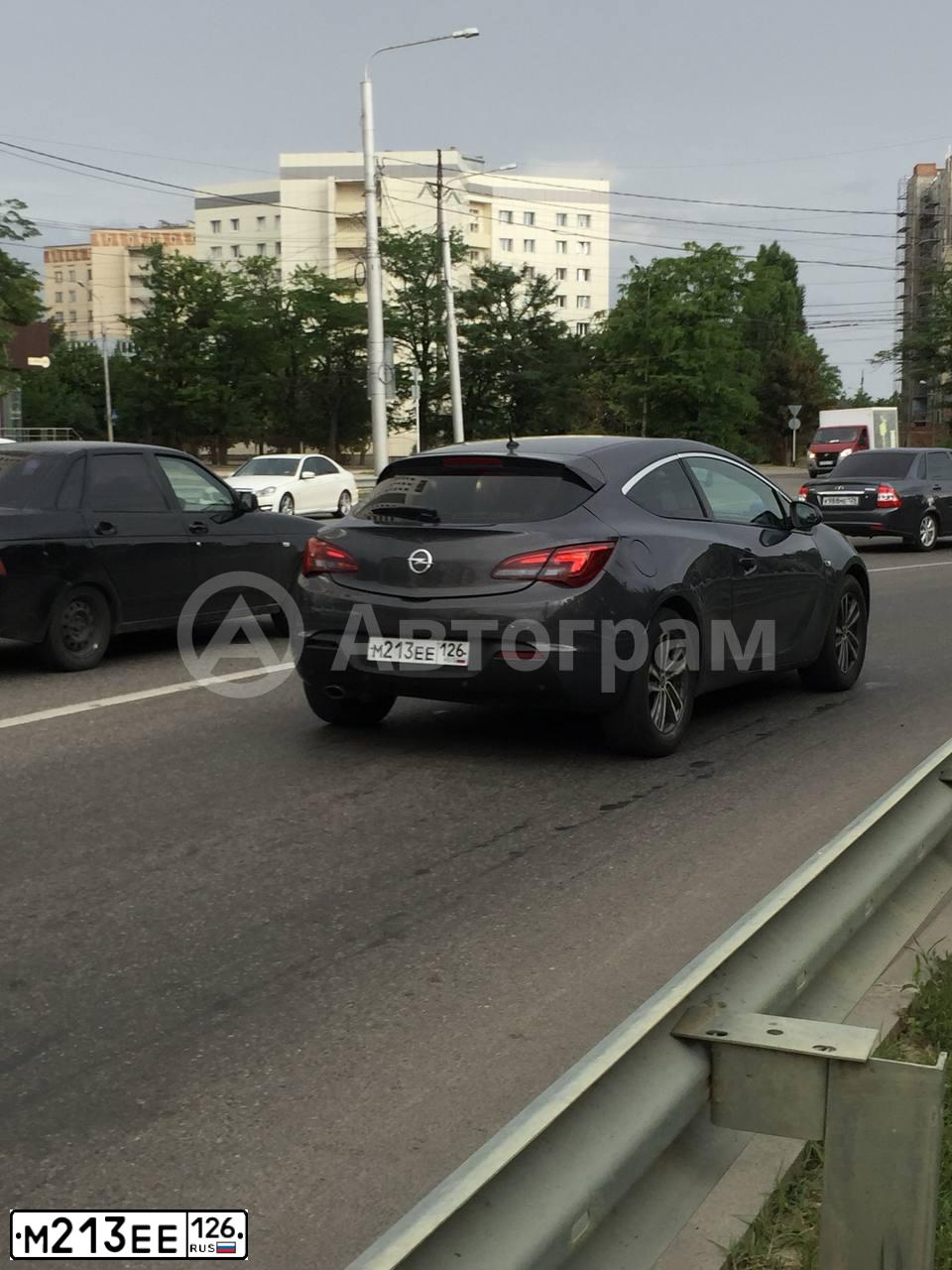 Фото автомобиля OPEL ASTRA, 2013 — госномер М213ЕЕ126. Цвет: Серый