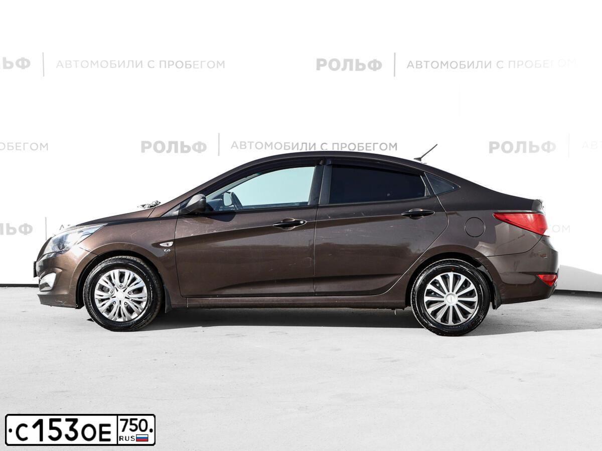Фото автомобиля HYUNDAI SOLARIS, 2016 — госномер С153ОЕ750. Цвет: Коричневый