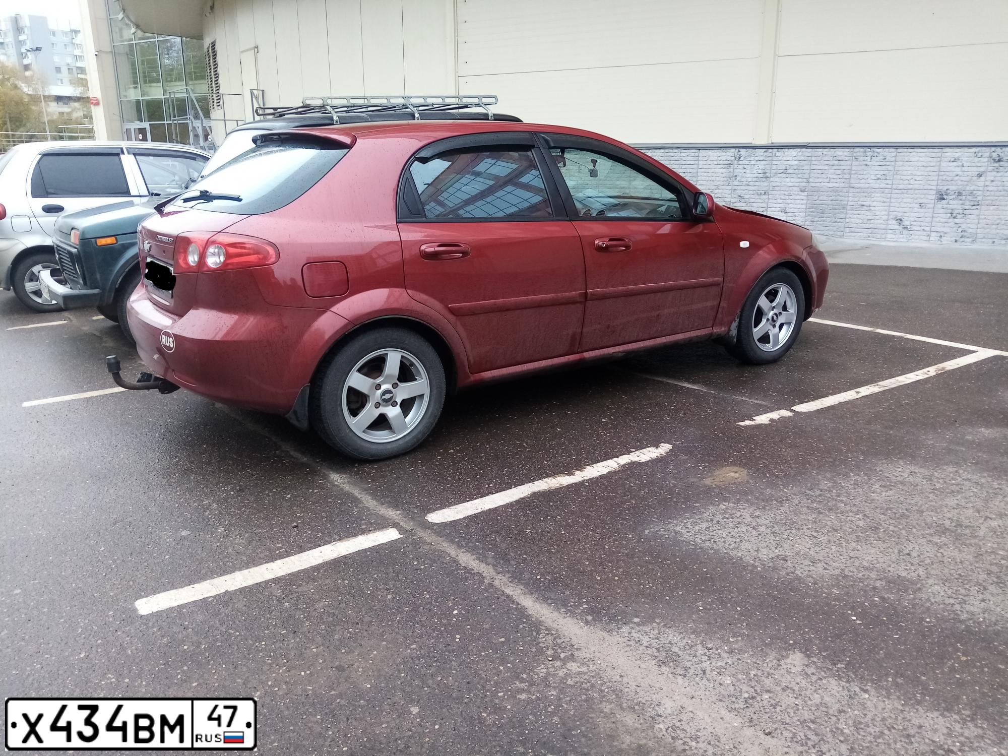 Фото автомобиля CHEVROLET T LACETTI, 2007 — госномер М646КС35. Цвет: Красный