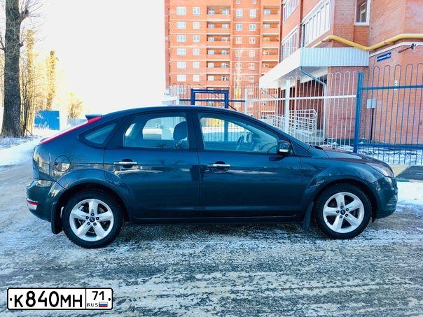 Фото автомобиля FORD FOCUS, 2010 — госномер О723ЕС71. Цвет: ТЕМНО-СЕРЫЙ