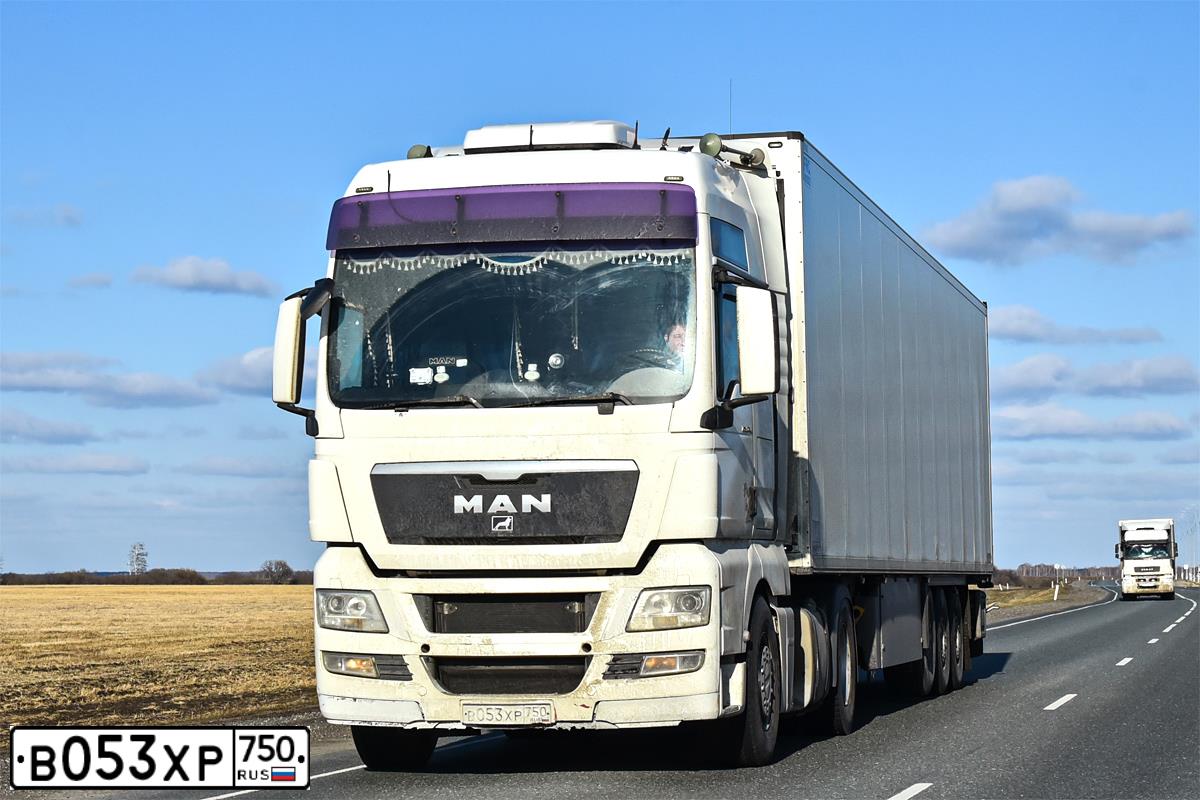 Фото автомобиля MAN TGX 18.XXX /4X2/, 2010 — госномер Х159ХХ44. Цвет: Белый