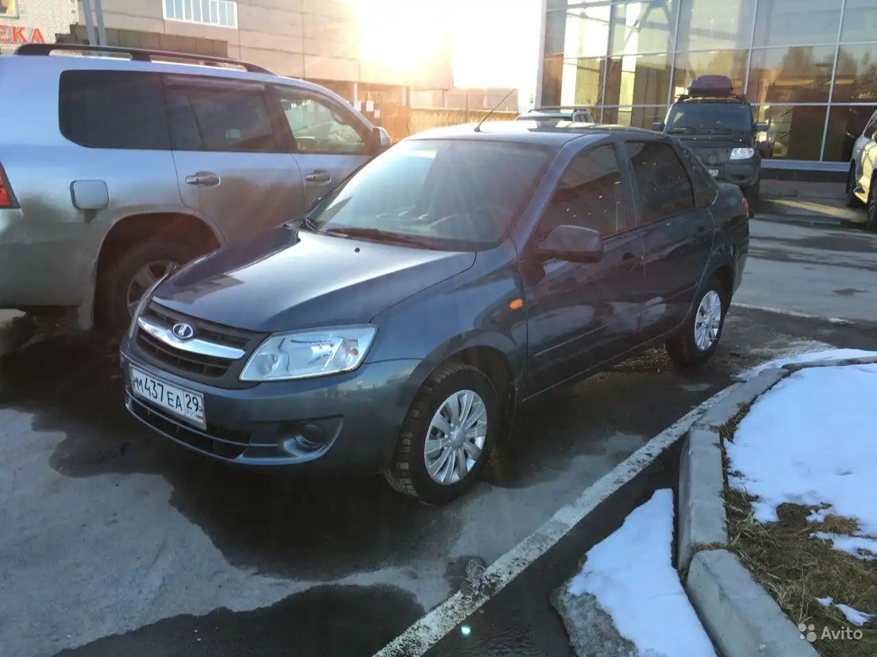 Фото автомобиля LADA 2190 GRANTA, 2014 — госномер М160ОХ29. Цвет: Серо-Синий