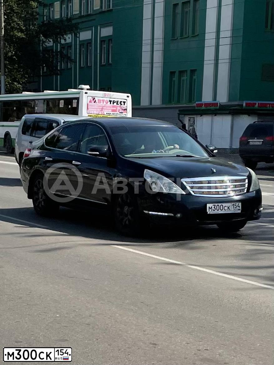 Фото автомобиля NISSAN TEANA, 2010 — госномер М300СК154. Цвет: ЧЕРНЫЙ