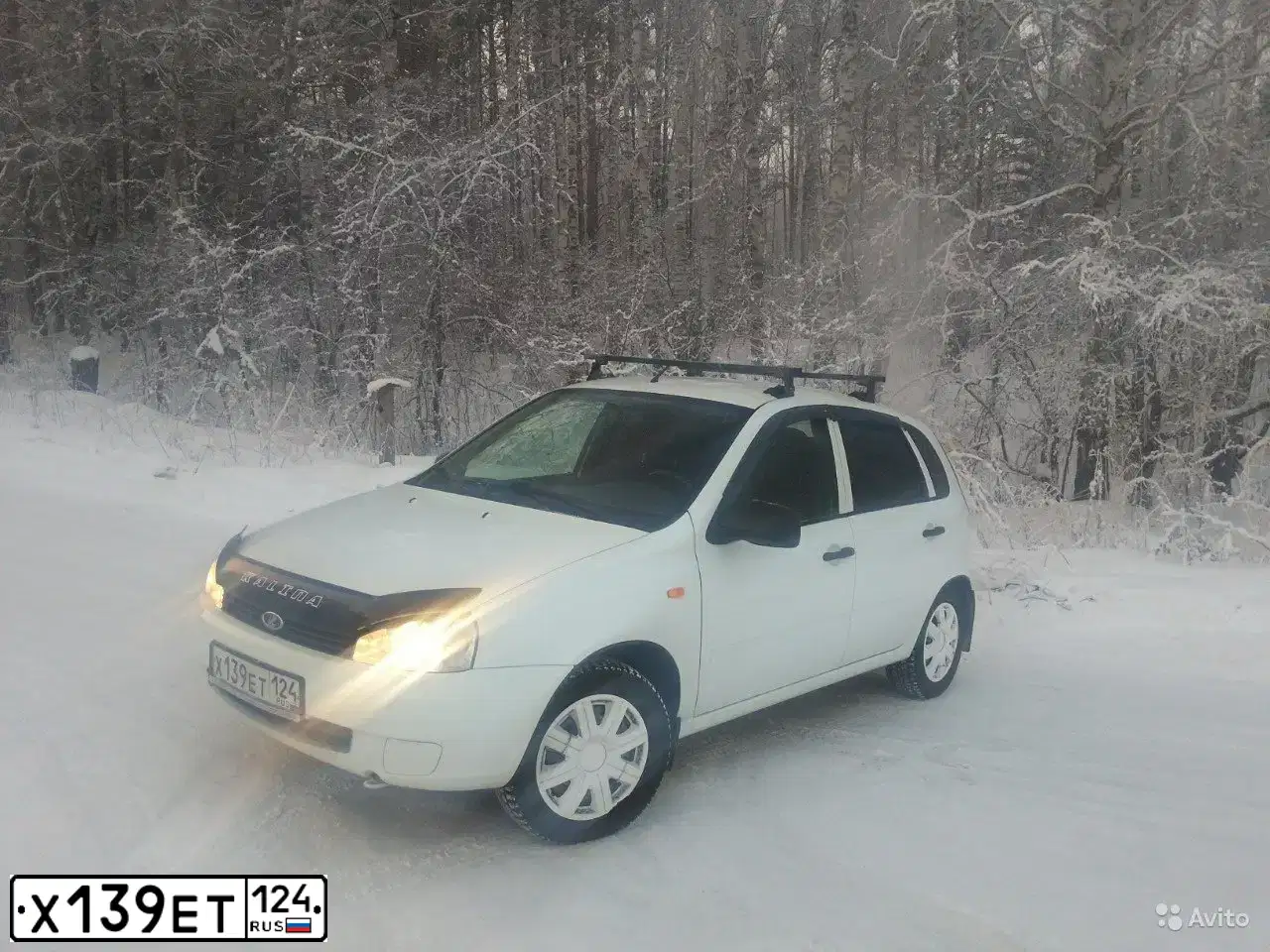 Фото автомобиля LADA 1119 KALINA, 2012 — госномер Х139ЕТ124. Цвет: БЕЛЫЙ