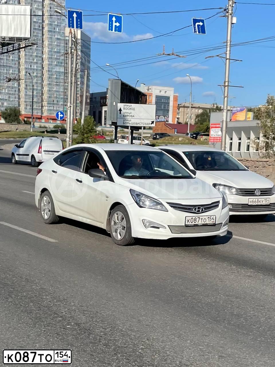 Фото автомобиля HYUNDAI SOLARIS, 2014 — госномер К087ТО154. Цвет: Белый