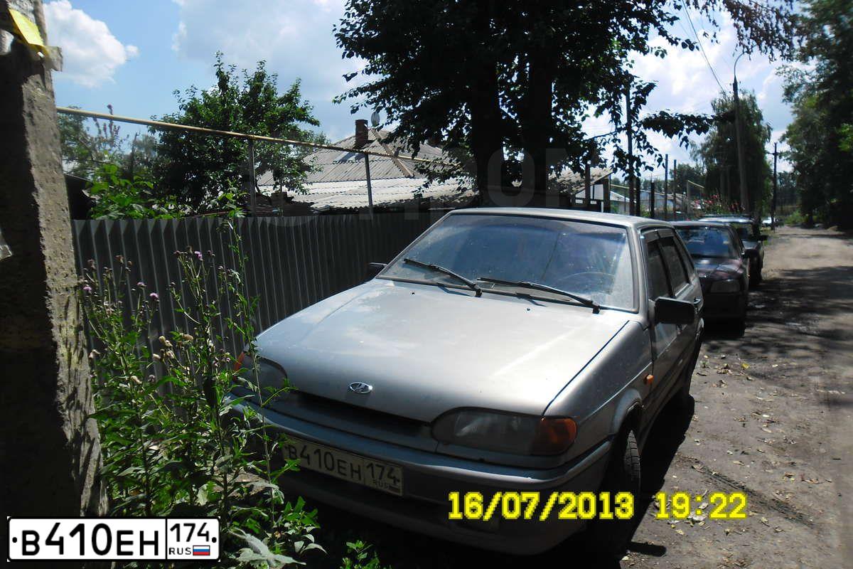 Фото автомобиля LADA 2114 SAMARA, 2004 — госномер Р976ТМ174. Цвет: СЕРЫЙ