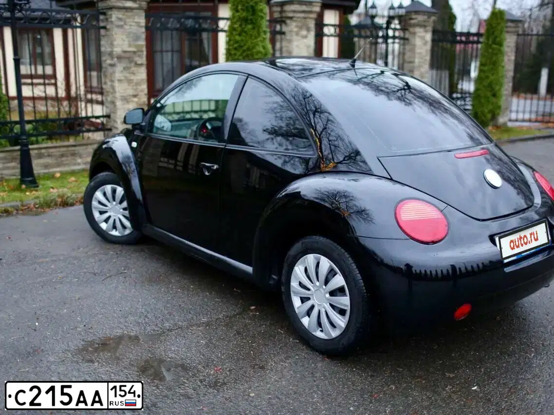 Фото автомобиля VOLKSWAGEN BEETLE, 2000 — госномер Т049ХН71. Цвет: ЧЕРНЫЙ