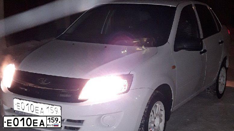 Фото автомобиля LADA 2190 GRANTA, 2013 — госномер Е010ЕА159. Цвет: Белый