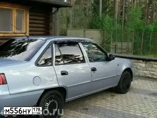 Фото автомобиля DAEWOO NEXIA, 2012 — госномер А835СХ147. Цвет: СЕРО-ПЕРЛАМУТРОВЫЙ