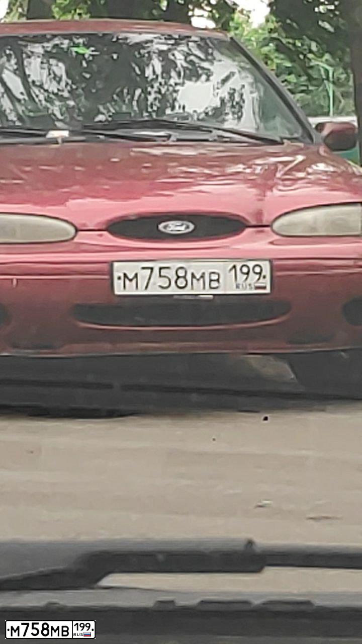Фото автомобиля FORD CONTOUR, 1996 — госномер М758МВ199. Цвет: Красный