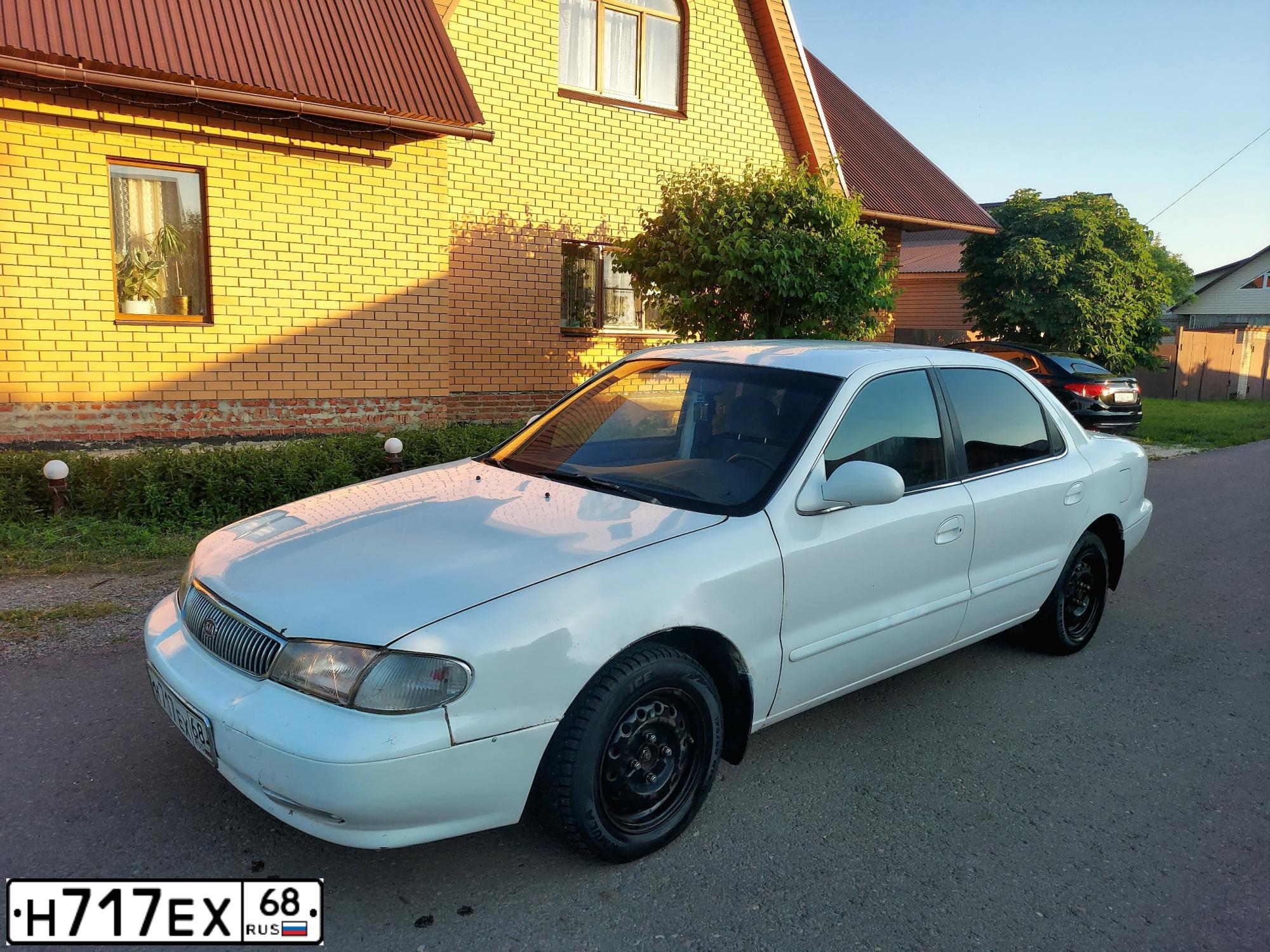 Фото автомобиля KIA CLARUS, 1997 — госномер Н717ЕХ68. Цвет: БЕЛЫЙ