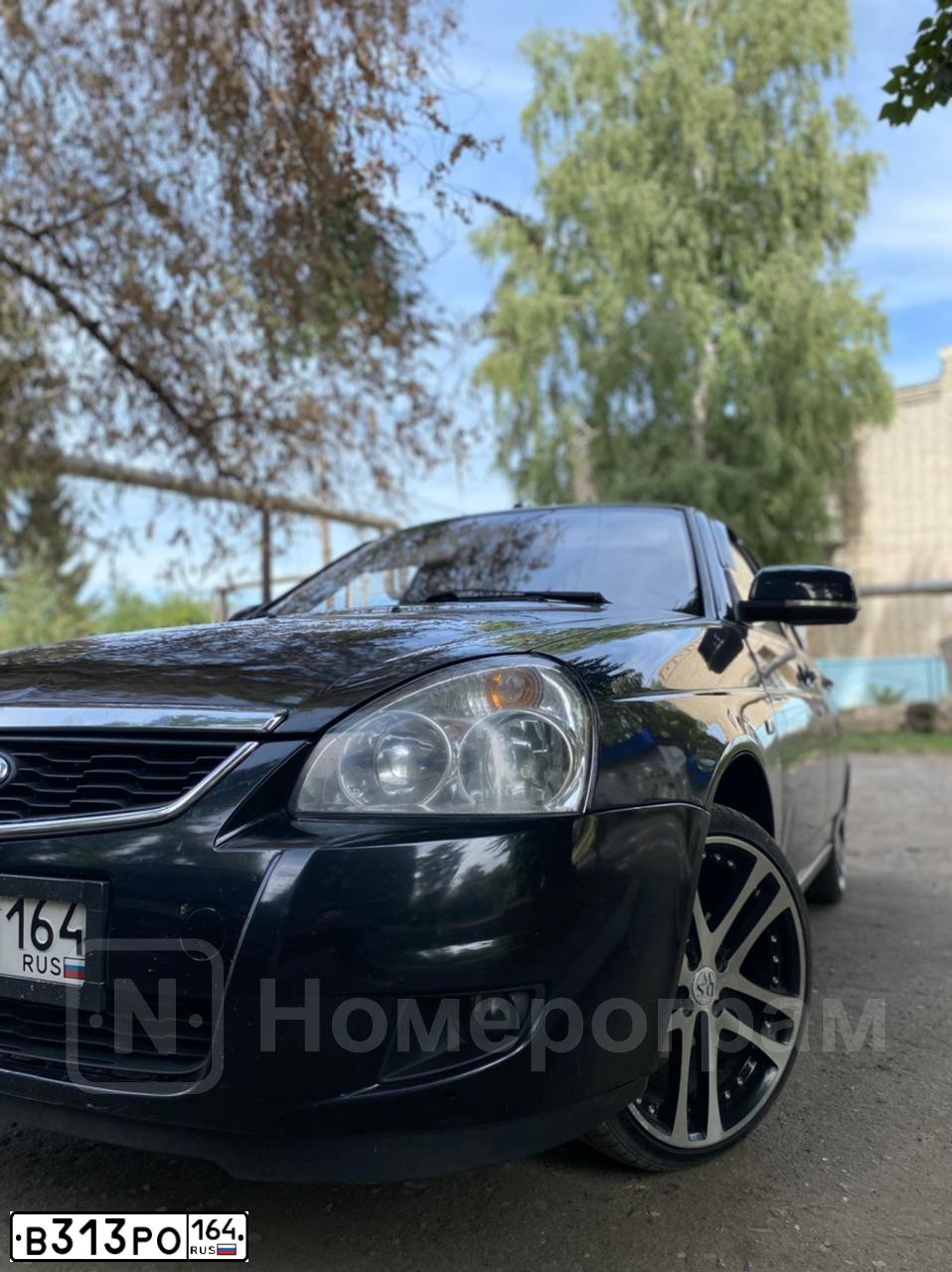Фото автомобиля LADA 2170 PRIORA, 2009 — госномер В313РО164. Цвет: Сине-Черный