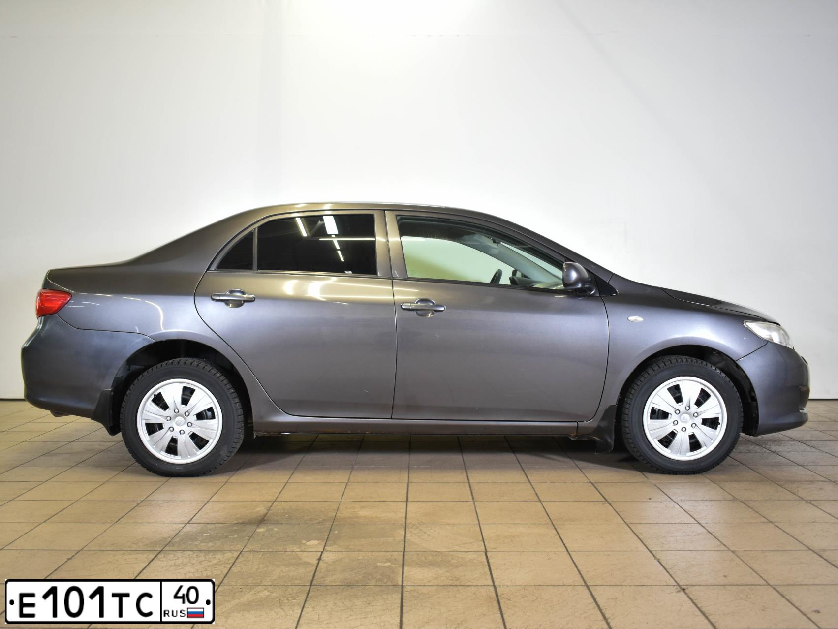 Фото автомобиля TOYOTA COROLLA, 2007 — госномер К823УО69. Цвет: СЕРЫЙ