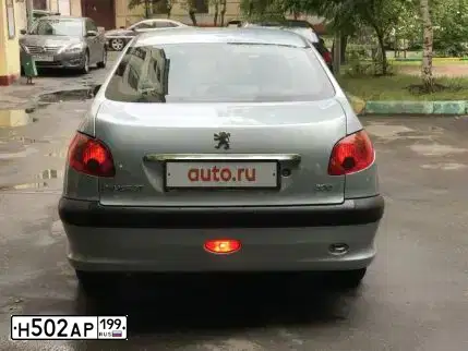 Фото автомобиля PEUGEOT 206, 2007 — госномер Н502АР199. Цвет: СЕРЫЙ