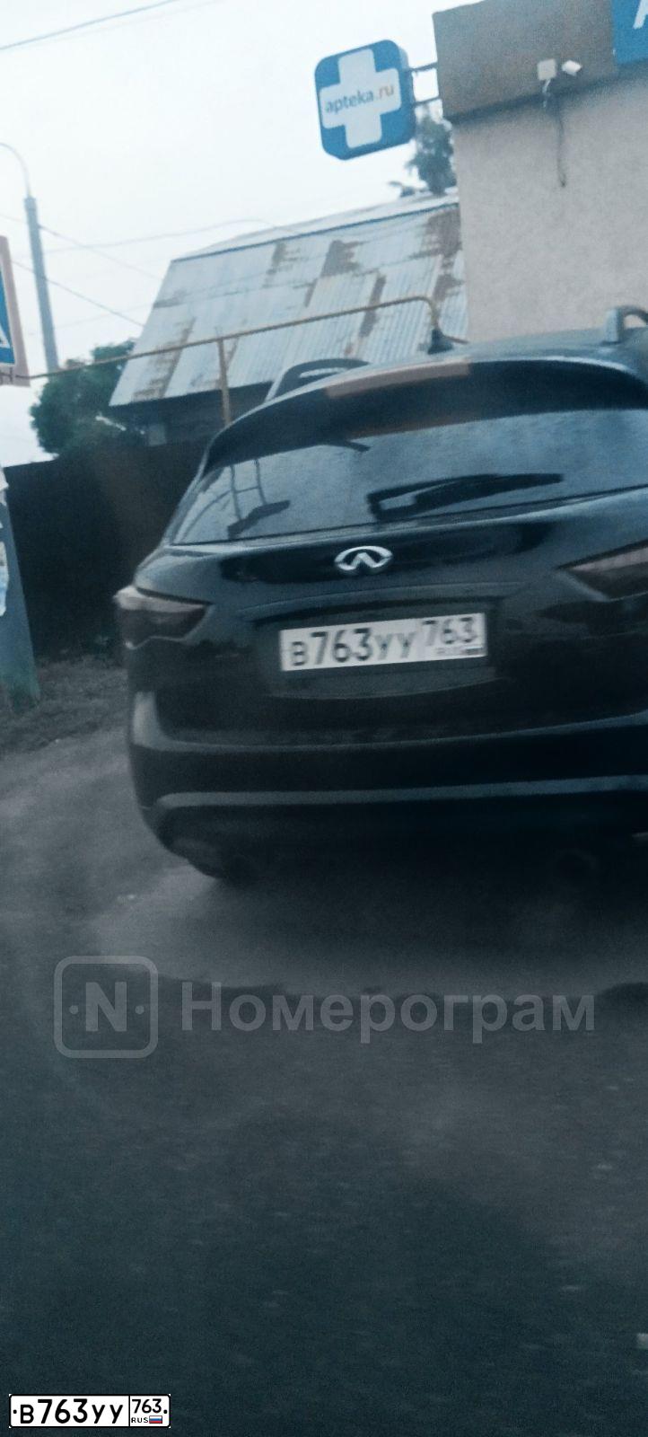 Фото автомобиля INFINITI QX70 /FX/, 2014 — госномер Е304ОВ156. Цвет: ЧЕРНЫЙ