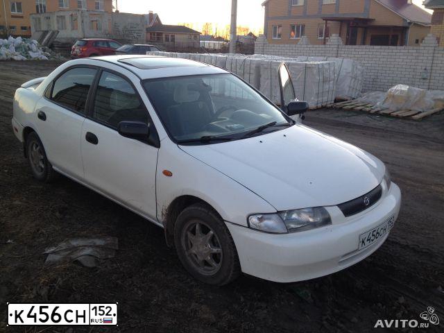 Фото автомобиля MAZDA 323, 1997 — госномер К456СН152. Цвет: БЕЛЫЙ
