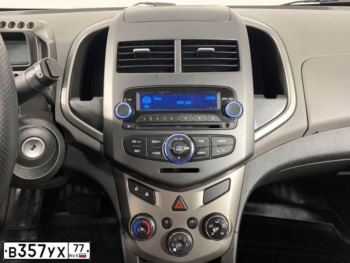 Фото автомобиля CHEVROLET AVEO, 2012 — госномер К725ТР69. Цвет: Белый
