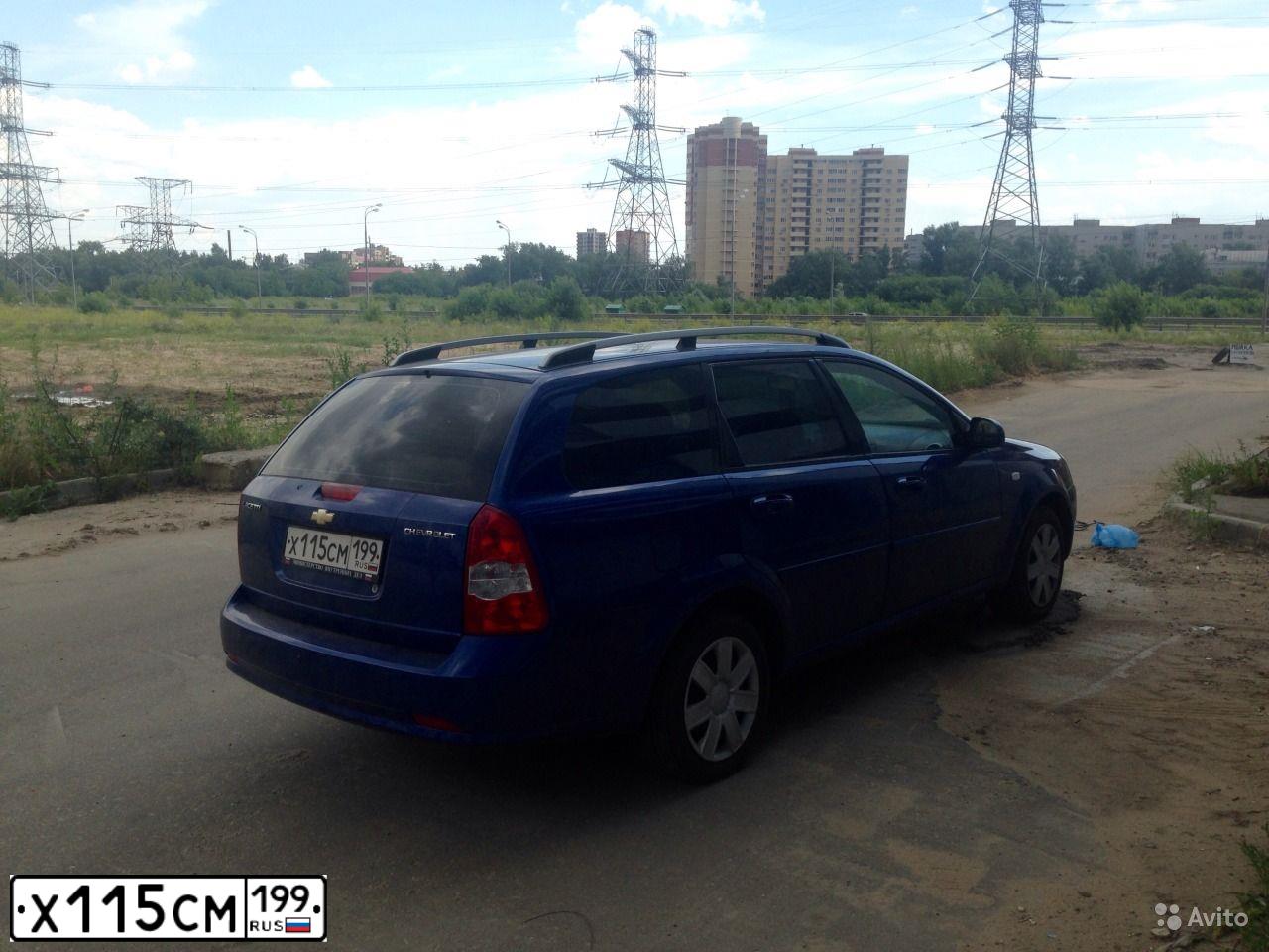 Фото автомобиля CHEVROLET LACETTI, 2008 — госномер Е387КО76. Цвет: СИНИЙ