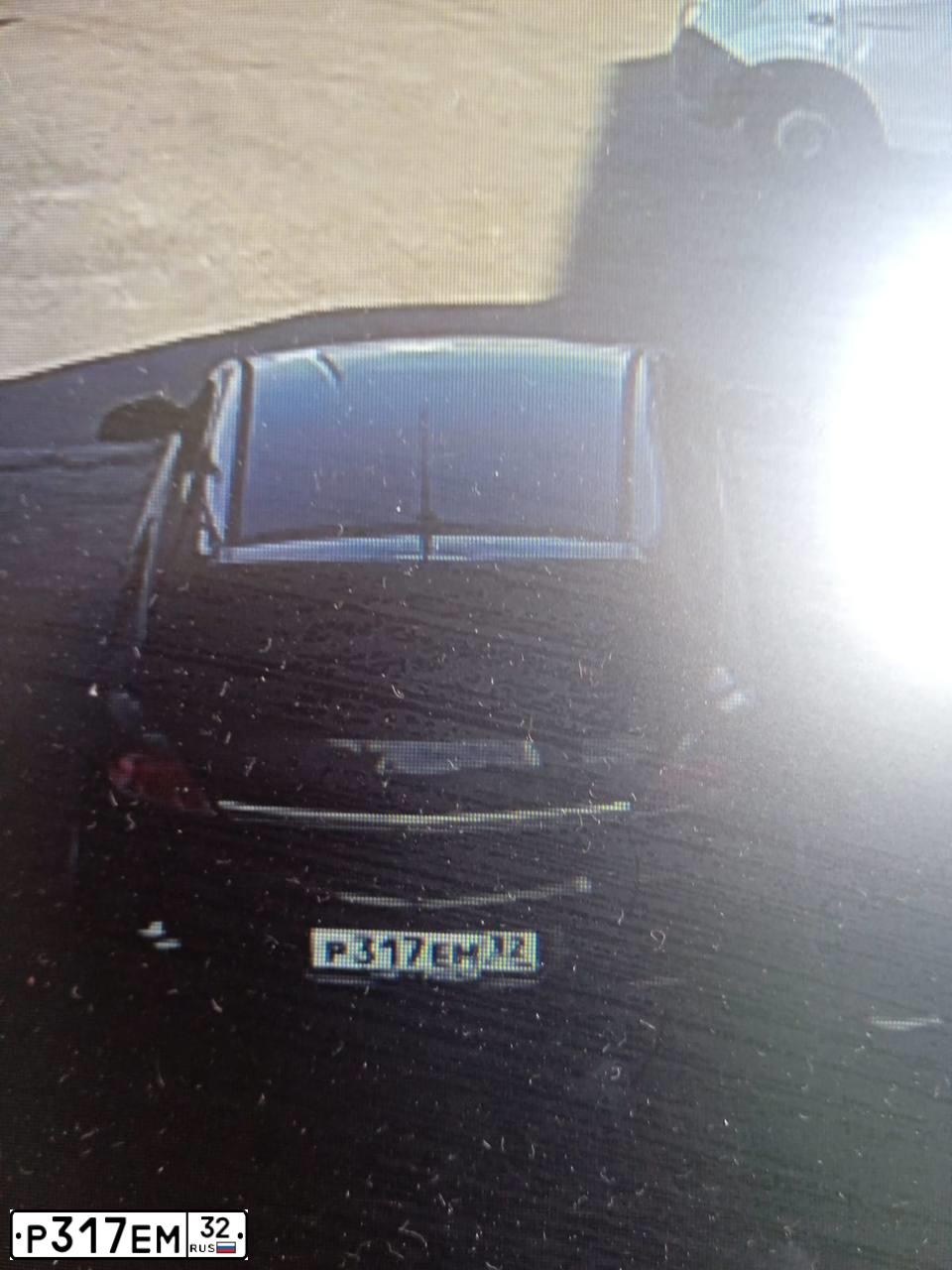 Фото автомобиля OPEL ASTRA, 2011 — госномер Р317ЕМ32. Цвет: ЧЕРНЫЙ