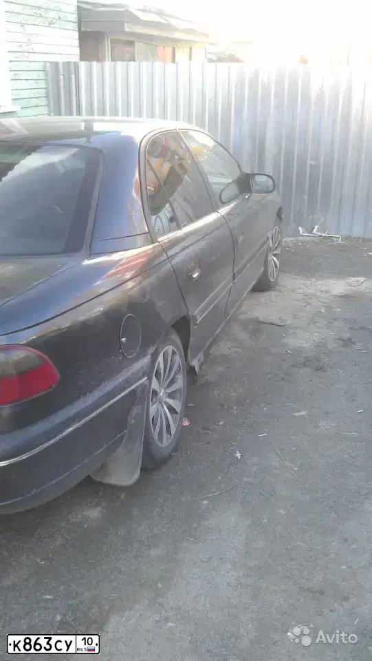 Фото автомобиля OPEL OMEGA, 1997 — госномер Н880ЕУ10. Цвет: ЧЕРНЫЙ