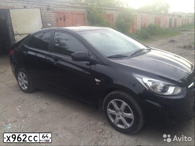 Фото автомобиля HYUNDAI SOLARIS, 2012 — госномер Х962СС64. Цвет: ЧЕРНЫЙ