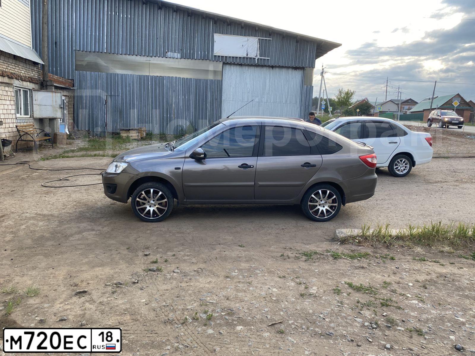 Фото автомобиля LADA 2191 GRANTA, 2017 — госномер М720ЕС18. Цвет: золотисто коричневый