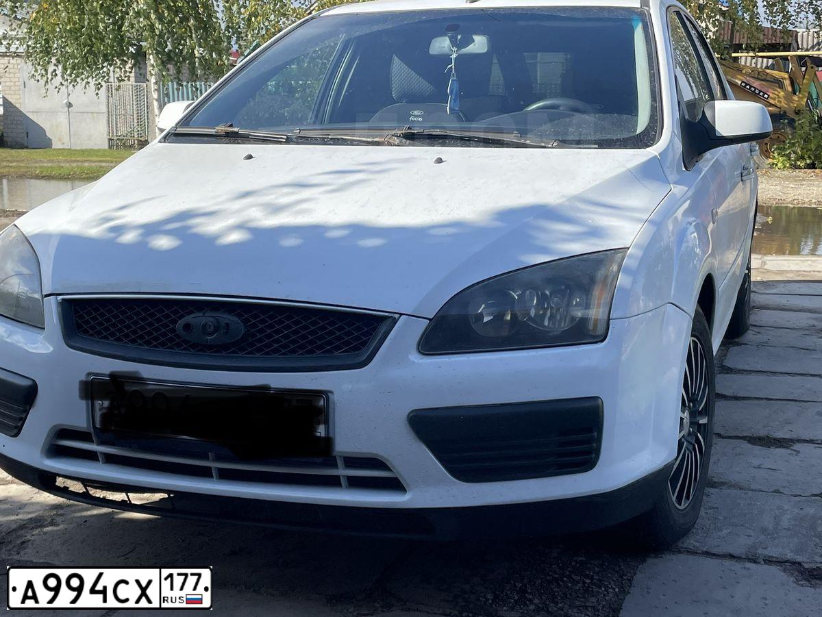 Фото автомобиля FORD FOCUS, 2007 — госномер Х809СО31. Цвет: Белый