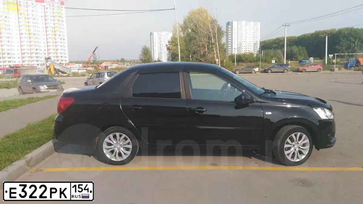 Фото автомобиля DATSUN ON-DO, 2016 — госномер Е322РК154. Цвет: ЧЕРНЫЙ