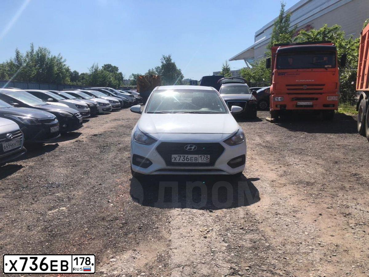 Фото автомобиля HYUNDAI SOLARIS, 2017 — госномер Х736ЕВ178. Цвет: Белый