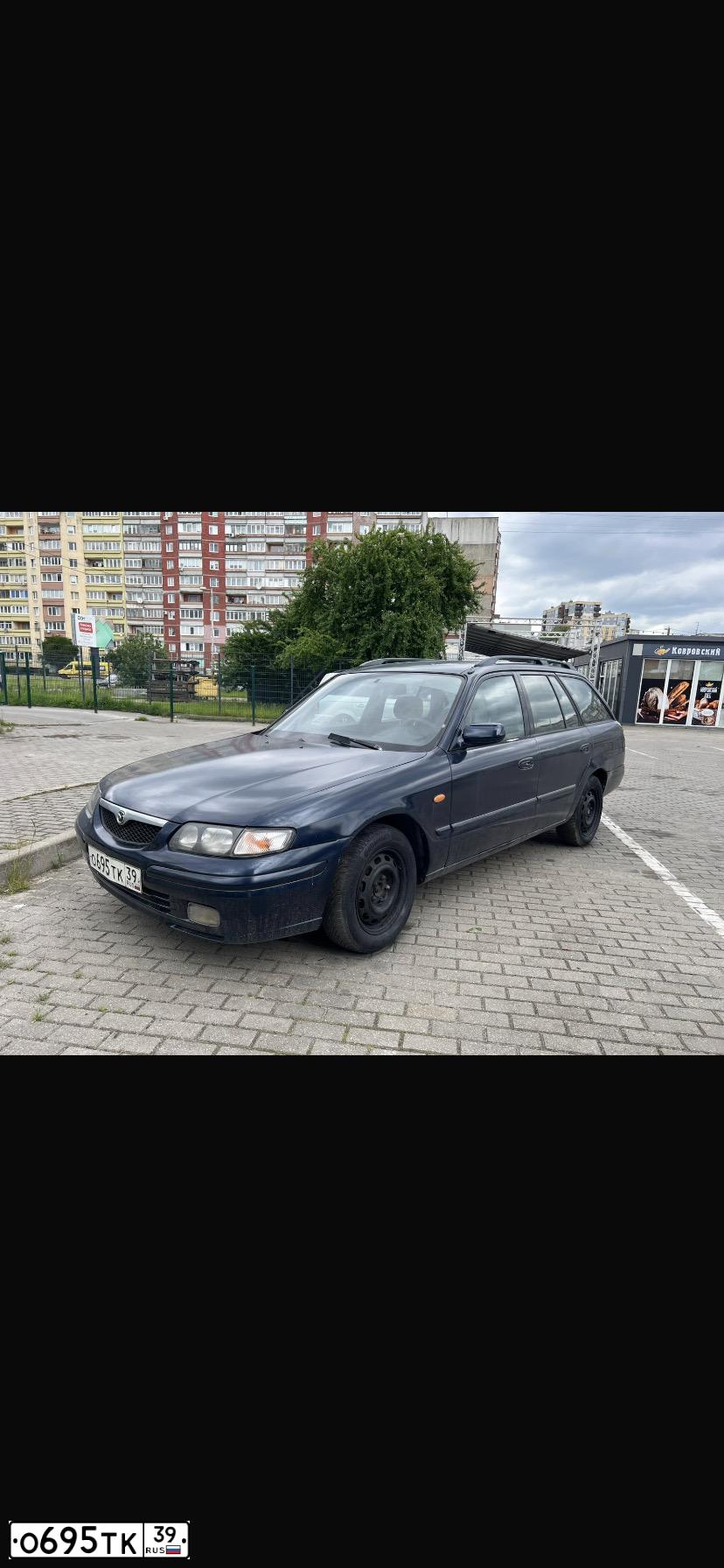 Фото автомобиля MAZDA A 626, 1999 — госномер О695ТК39. Цвет: СИНИЙ