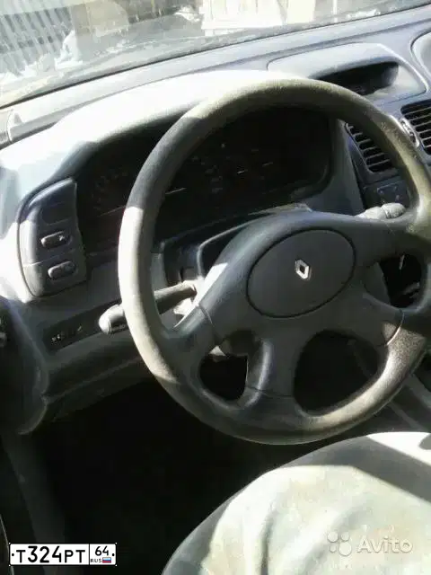 Фото автомобиля RENAULT LAGUNA, 1995 — госномер Т324РТ64. Цвет: Серый