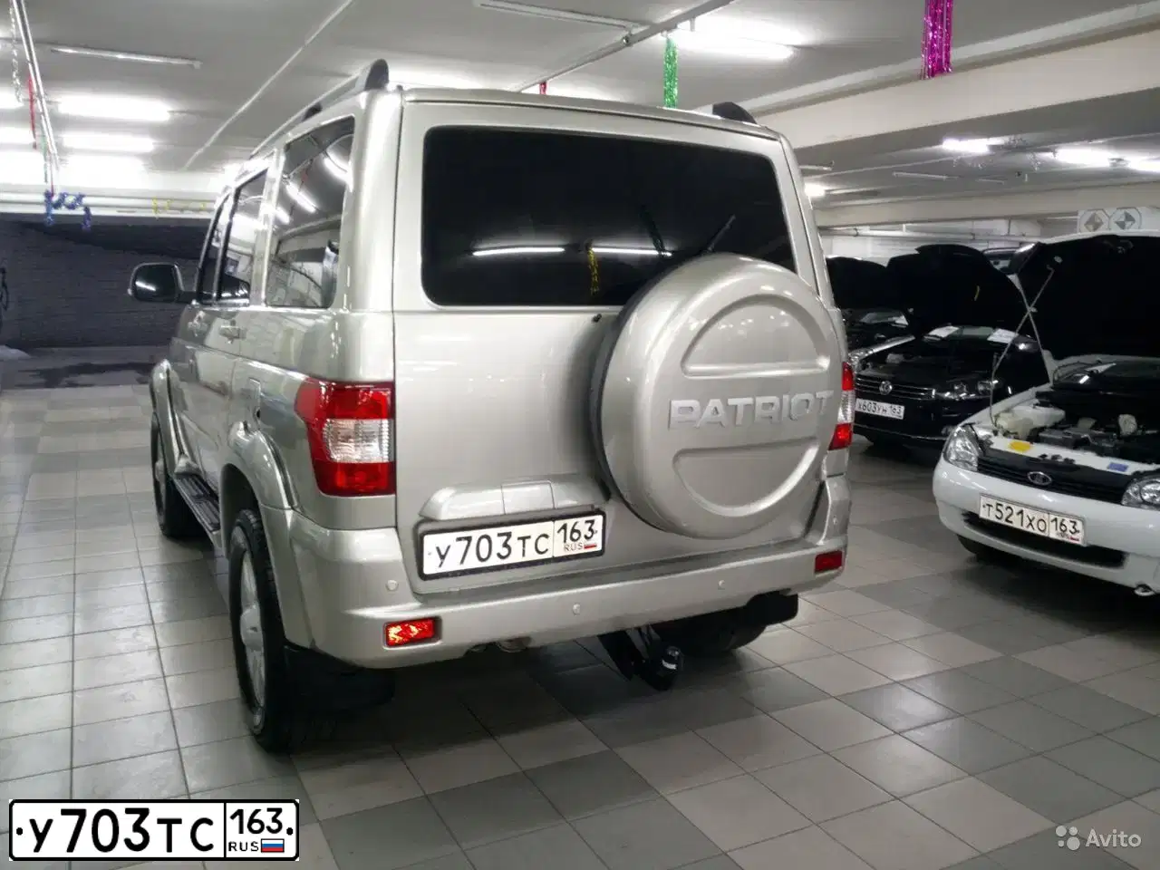 Фото автомобиля UAZ 3163 PATRIOT, 2014 — госномер Е971ТВ126. Цвет: СЕРЕБРИСТО-ЖЕЛТЫЙ МЕТАЛИК