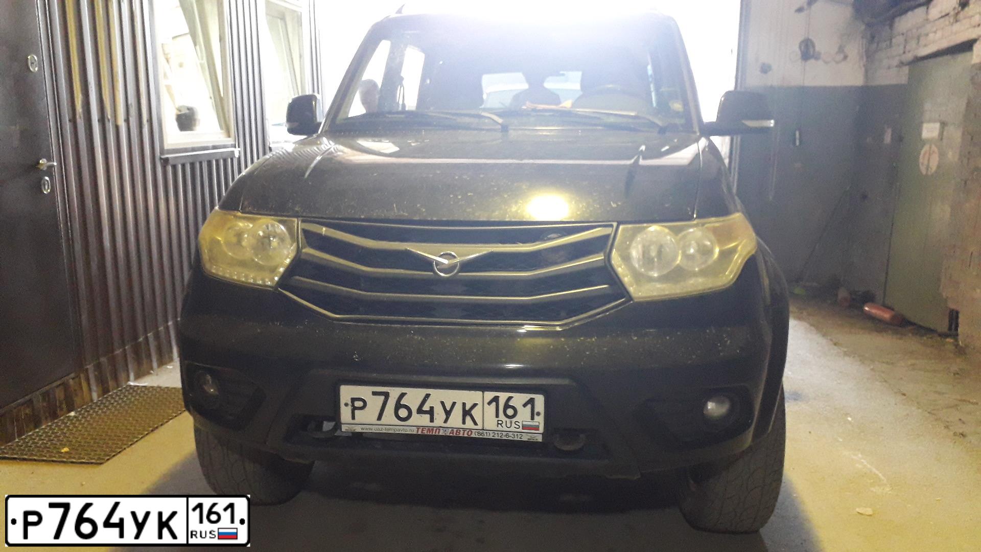 Фото автомобиля UAZ 3163 PATRIOT, 2014 — госномер Р764УК161. Цвет: ЧЕРНЫЙ