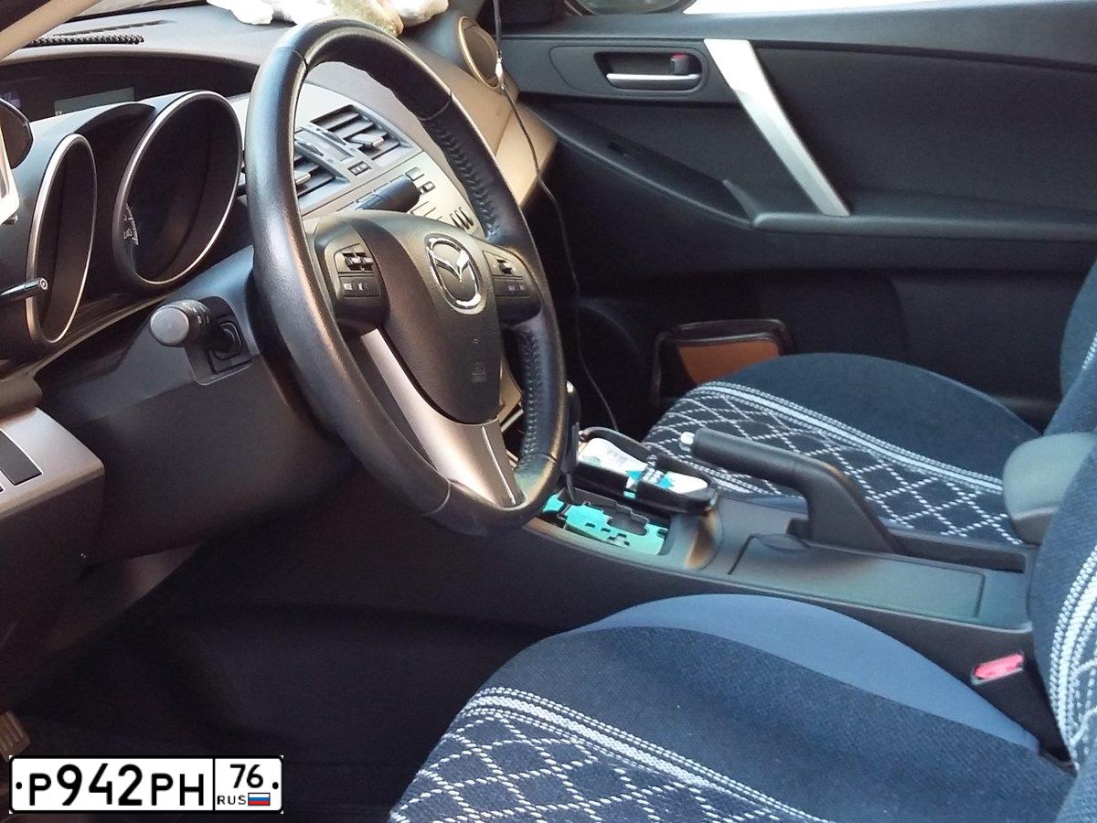 Фото автомобиля MAZDA 3, 2012 — госномер Е228СР777. Цвет: ТЕМНО-СЕРЫЙ