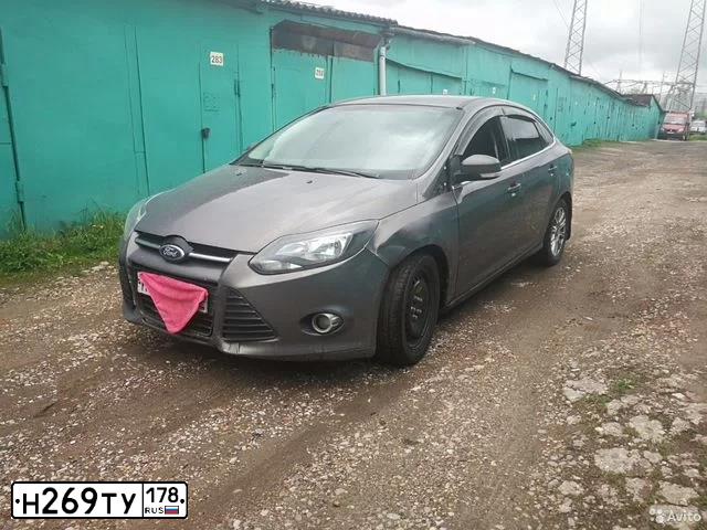 Фото автомобиля FORD FOCUS, 2013 — госномер Н269ТУ178. Цвет: СЕРО-КОРИЧНЕВЫЙ
