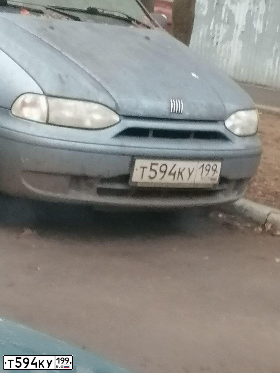 Фото автомобиля FIAT PALIO, 2002 — госномер Т594КУ199. Цвет: ГОЛУБОЙ