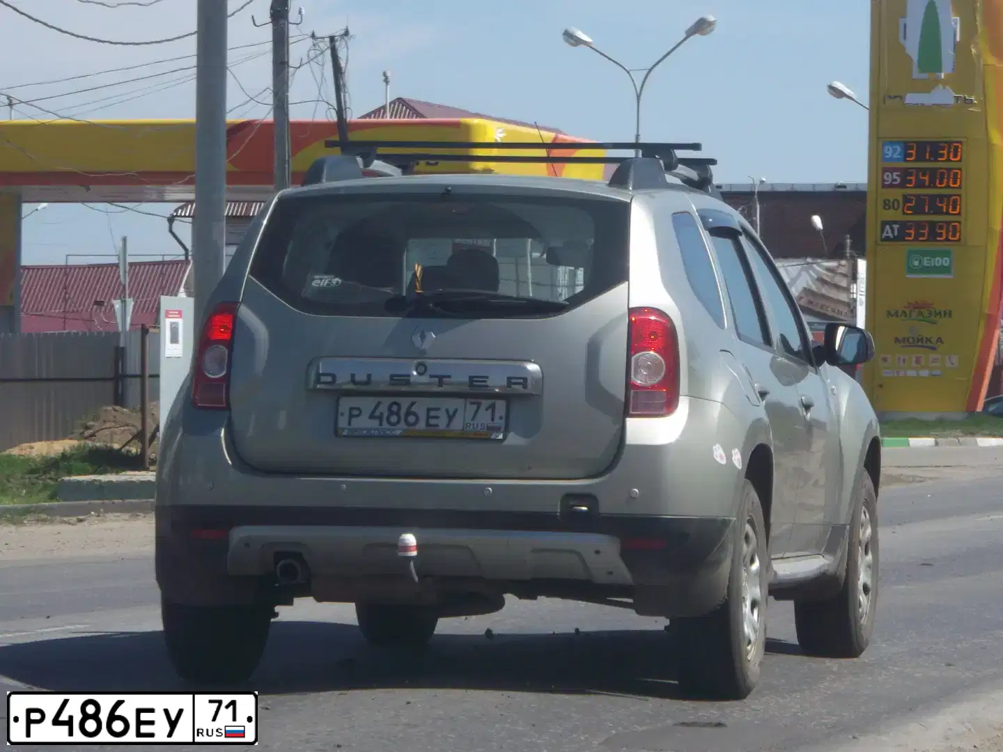 Фото автомобиля RENAULT DUSTER, 2013 — госномер О109ХЕ32. Цвет: БЕЖЕВЫЙ